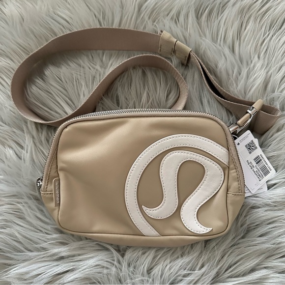 lululemon athletica Handbags - LULULEMON Everywhere Belt Bag 1L in Trench/White Opal NWT